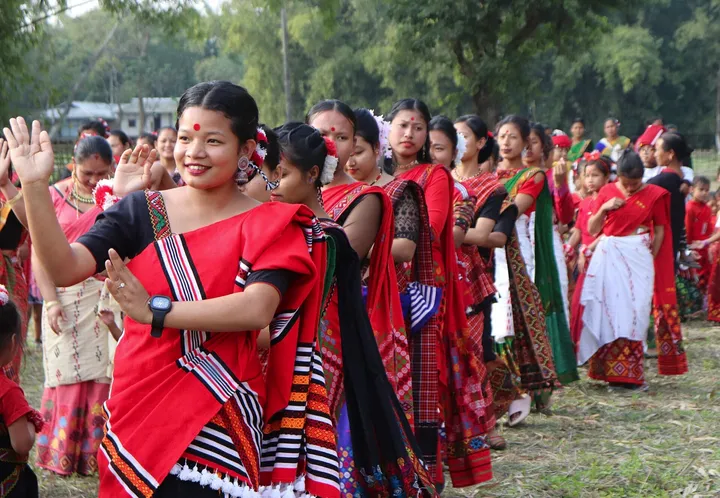 Mising women and girls dancing in traditional dress