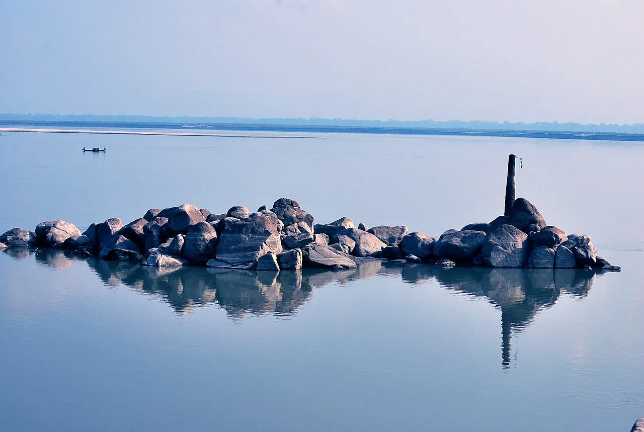 The Brahmaputra at Biswanath, with the rock islet that once held the steamer ghat's signal post